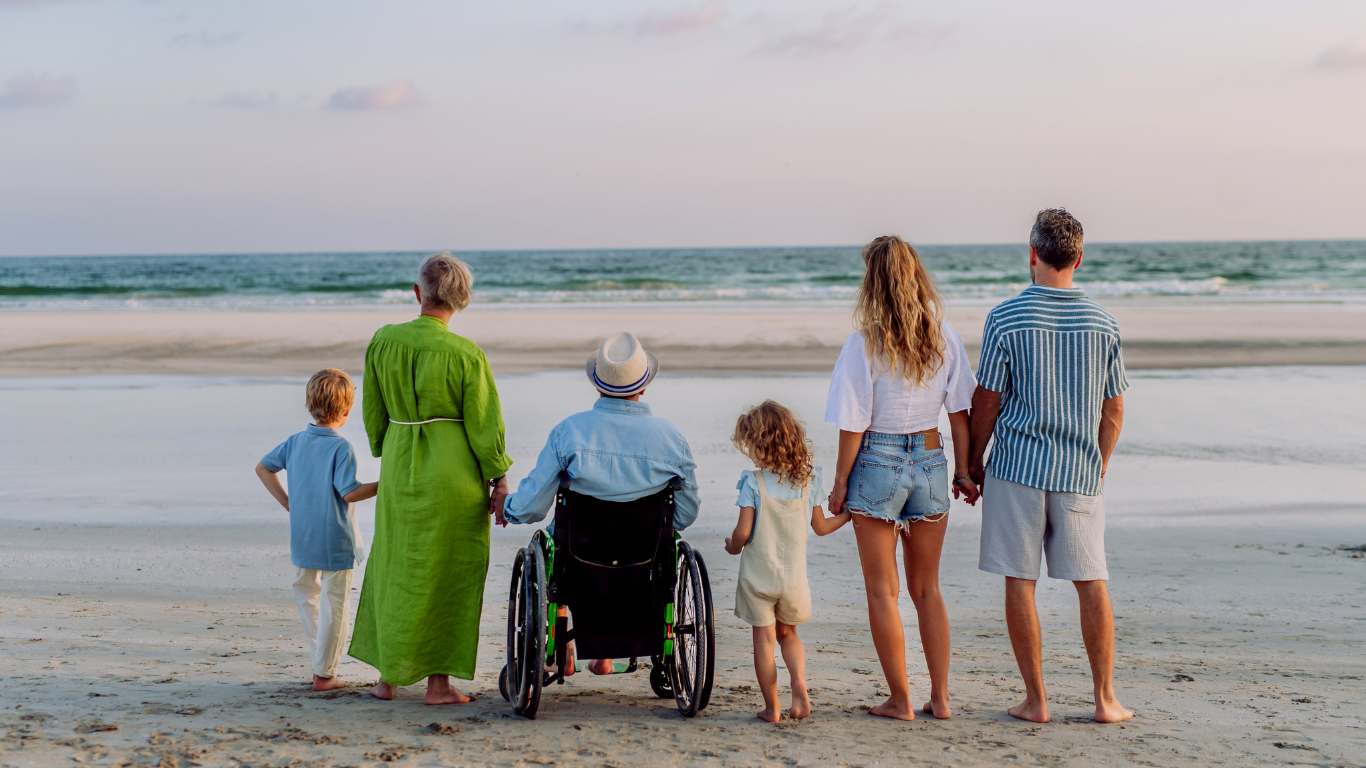 Blog Images (92) Multigenerational family looking into the ocean at the beach