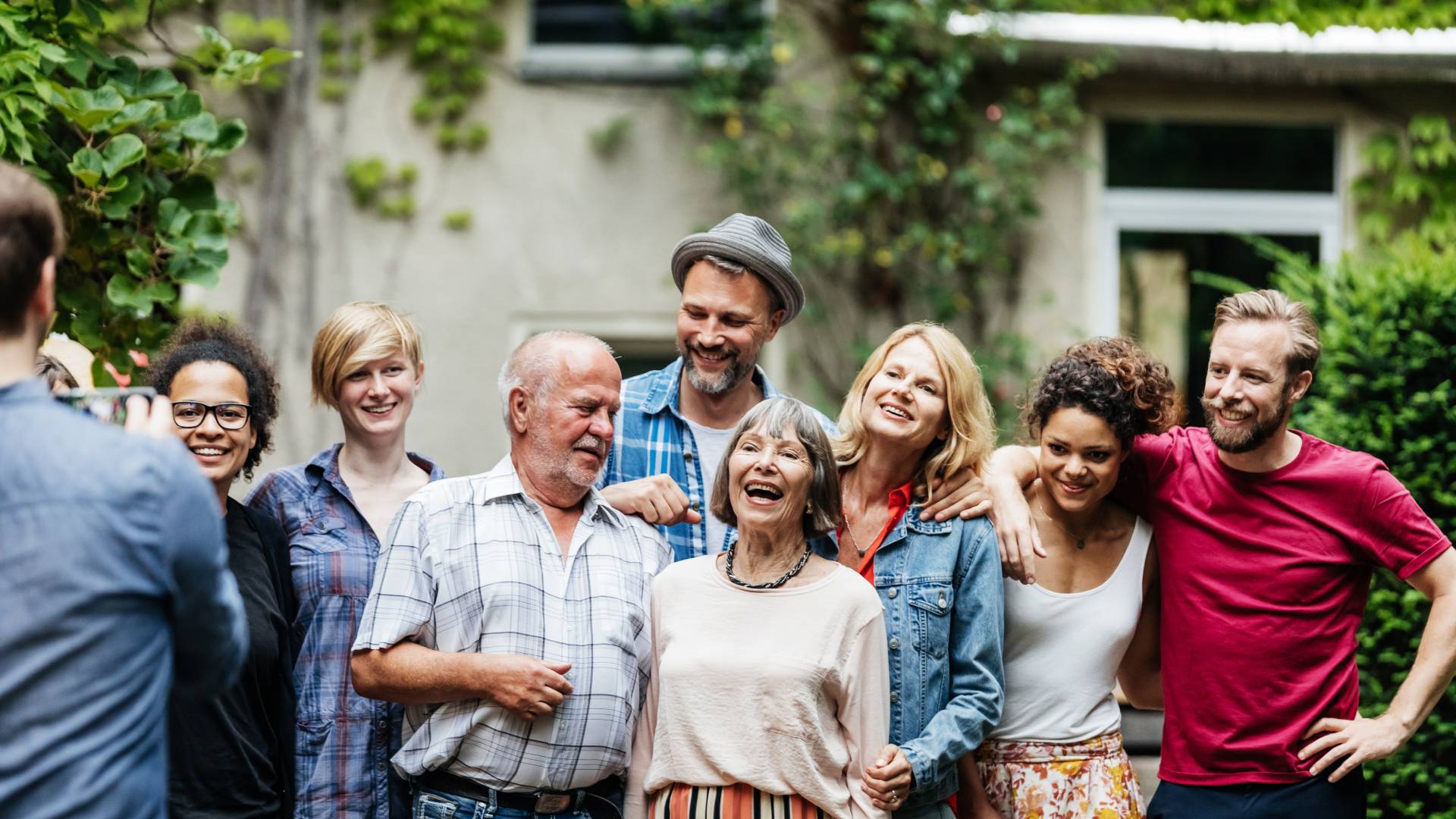 group of older adults spending time together outside a senior living community