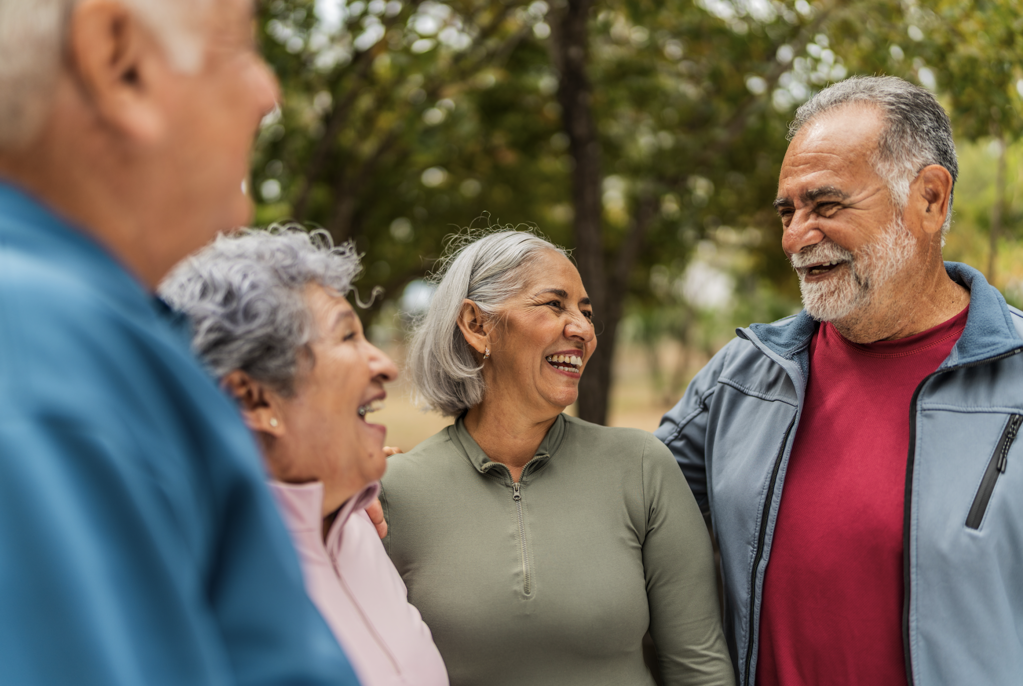 Group of smiling senior friends outdoors